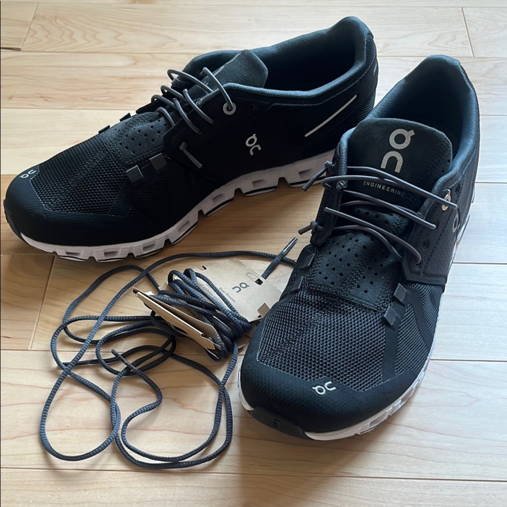 On Running Black Athletic Shoes with Cushioned Sole